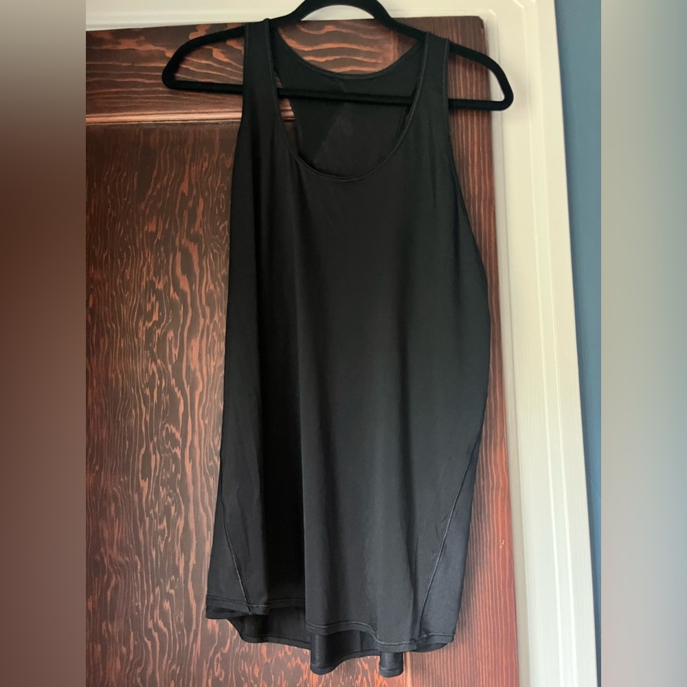 Lululemon tank, sz 10 Super light weight, great for the gym, running etc.